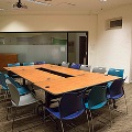 tables in a square with chairs lining
