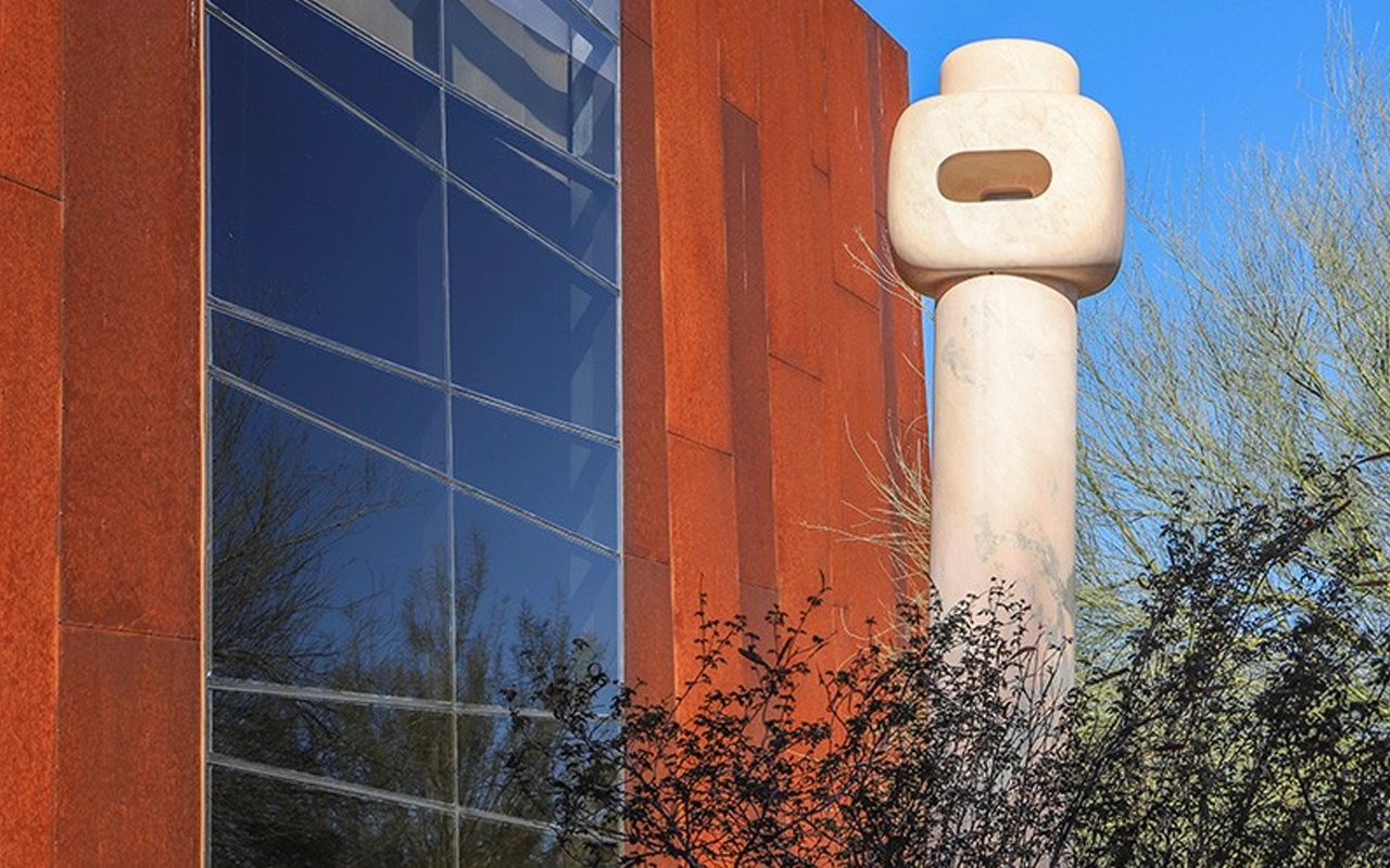large sculptural art in front of building