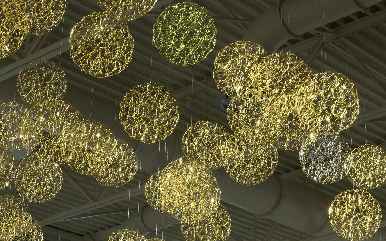hanging golden orbs from ceiling